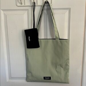 Prada Beauty tote and clutch